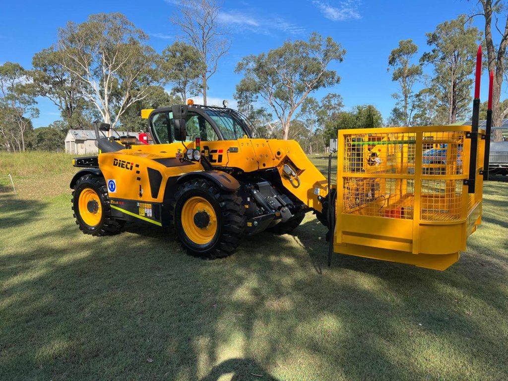 Front right side view of a Dieci Zeus 33.11 3.3T Telehandler with a yellow man backet