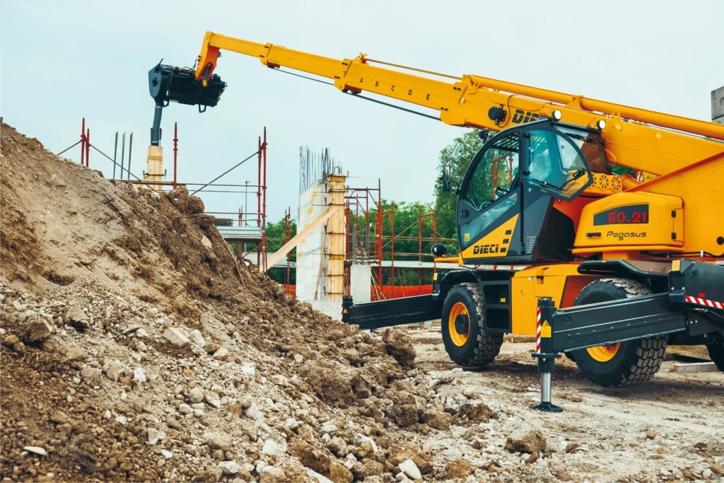 Image shows a Dieci Pegasus 400 rotating telehandler working on a construction site in Sydney, NSW