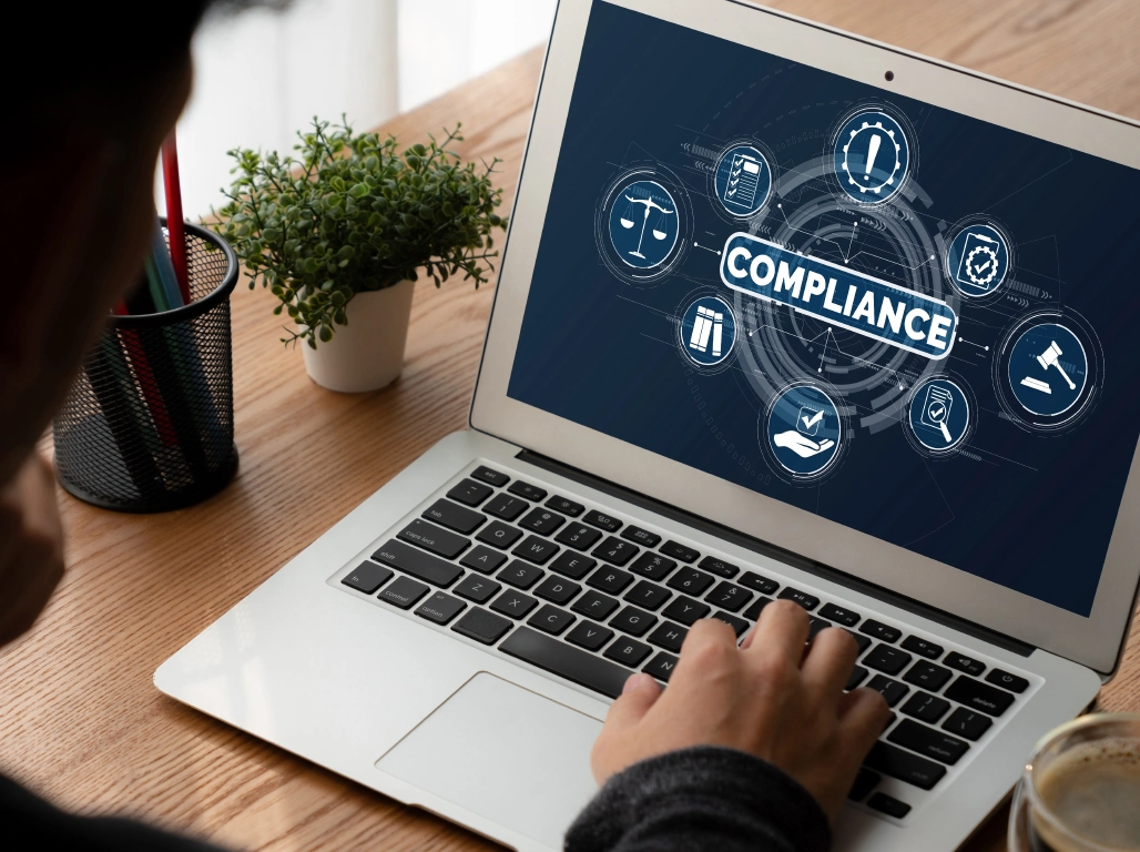 laptop with telehandler compliance documents