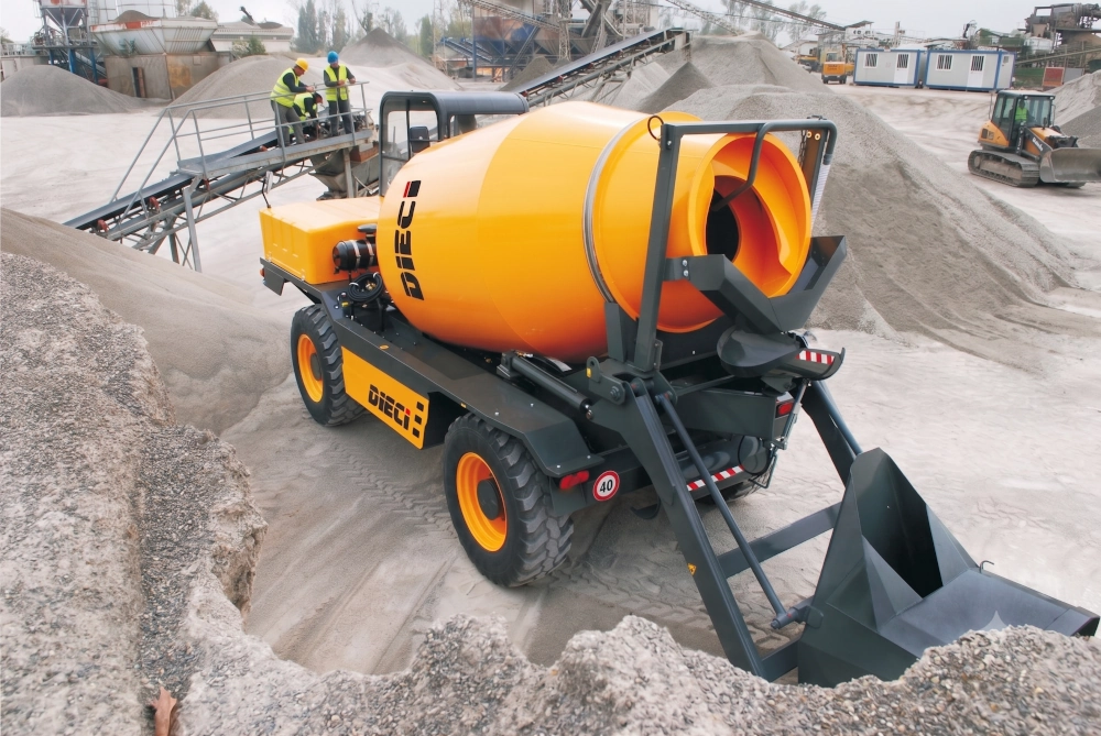 A Dieci concrete mixer truck being filled with concrete