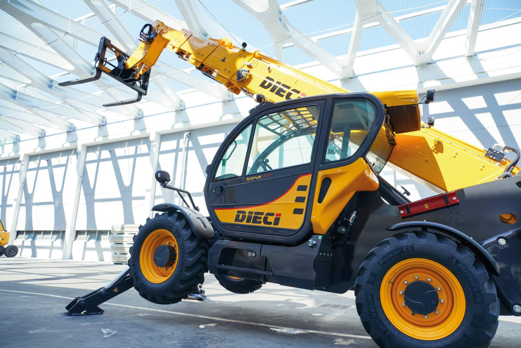 A Dieci telehandler with its stabilisers deployed