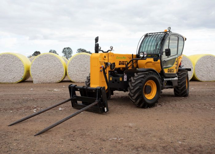 front view of a Cotton Pro 7t Telehandler with cotton bale spear with two prongs for lifting cotton bales