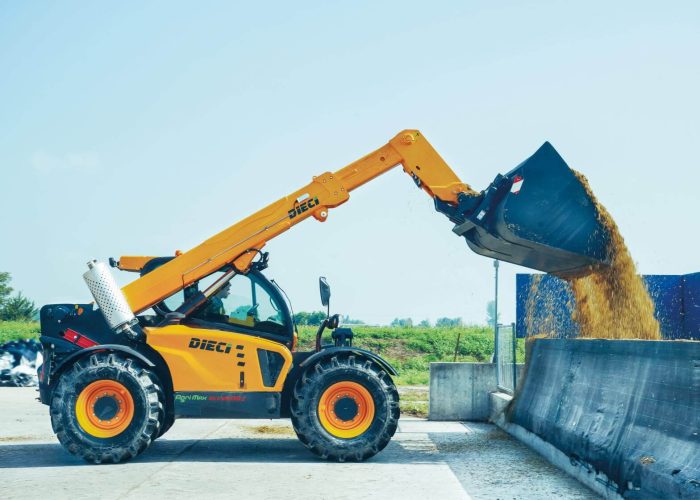 right side view of a Agri Max 7t Telehandler moving materials on a farm in NSW