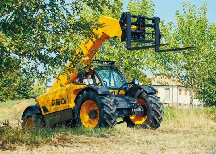 front side view of the Dedalus 3T Telehandler with a bucket lifted in the air