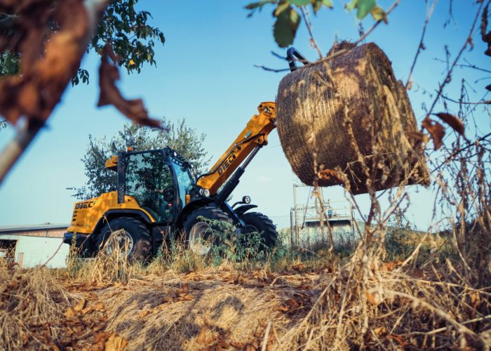 right side view of a Agri Pivot T70 3t Telescopic Loader carrying hay on an Australian farm
