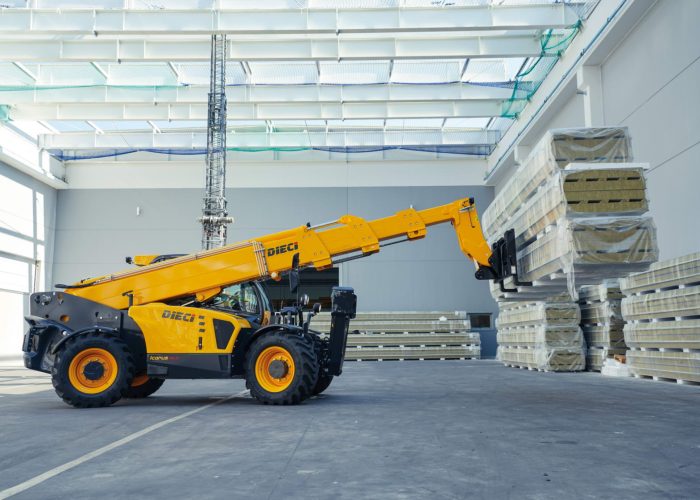 right side view of a Dieci Icarus 40.17 4T Telehandler moving heavy materials in a warehouse in Perth, Australia