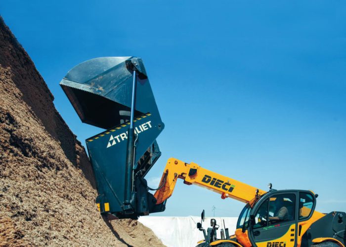 Agri Max 7t Telehandler working on an Australian farm scooping agricultural supplies