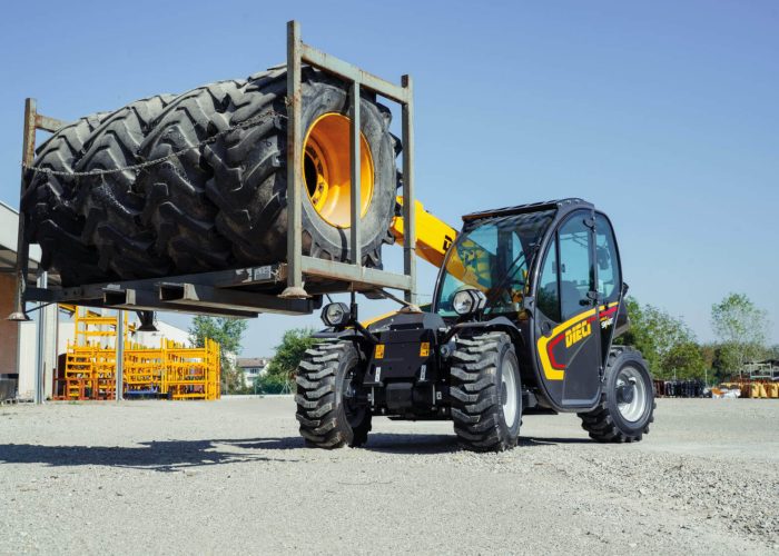 Apollo Smart 20.4 2t Compact Telehandler carrying tractor tyres for maintenance in Australia