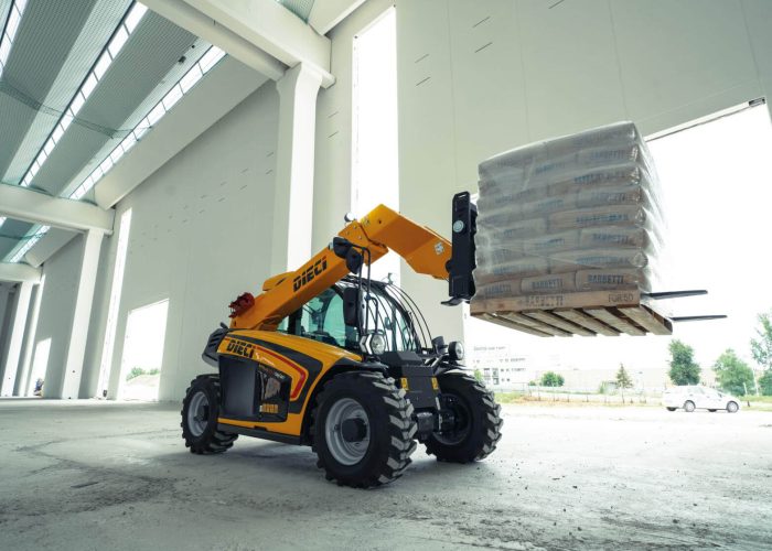 Apollo Smart 20.4 2t Compact Telehandler carrying 2tonnes of building materials at an Australian construction project