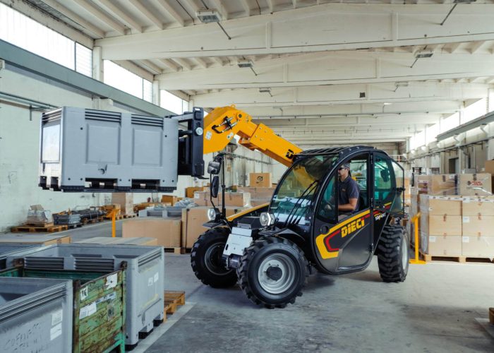 Apollo Smart 20.4 2t Compact Telehandler moving a 2tonne object inside an Australian work place