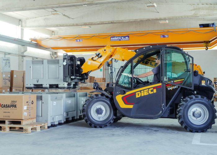 Apollo Smart 20.4 2t Compact Telehandler lifting a 2tonne object in an Australian warehouse