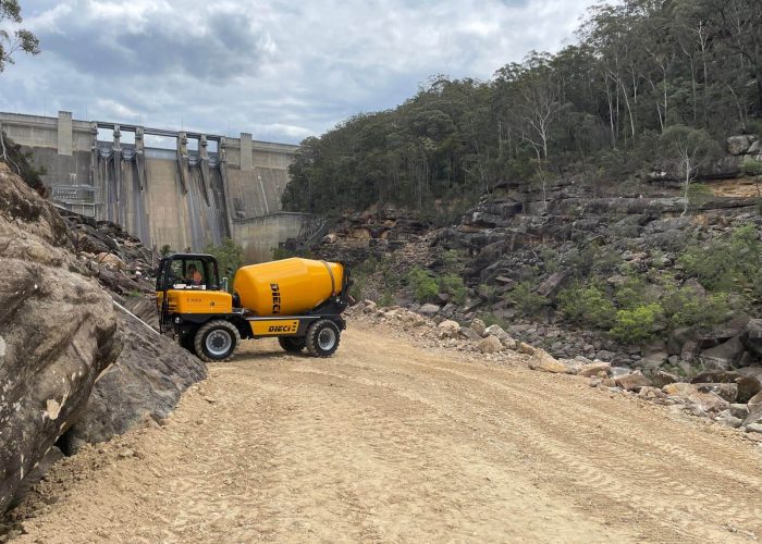 left side far view of a F7000T Mixer Truck with after mixing and pouring concrete on a Sydney infrastructure project