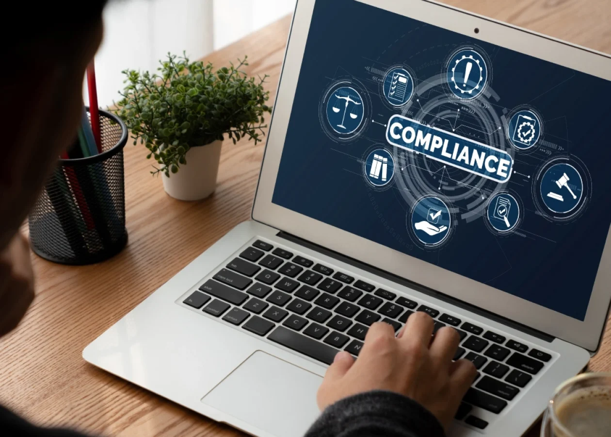 laptop with telehandler compliance documents