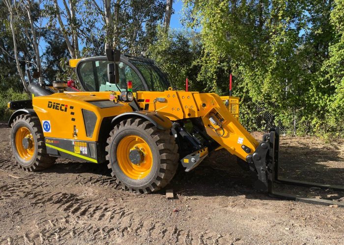 front right side view of a Dieci Zeus 33.11 3.3T Telehandler with its boom equipped with lifting forks lowered