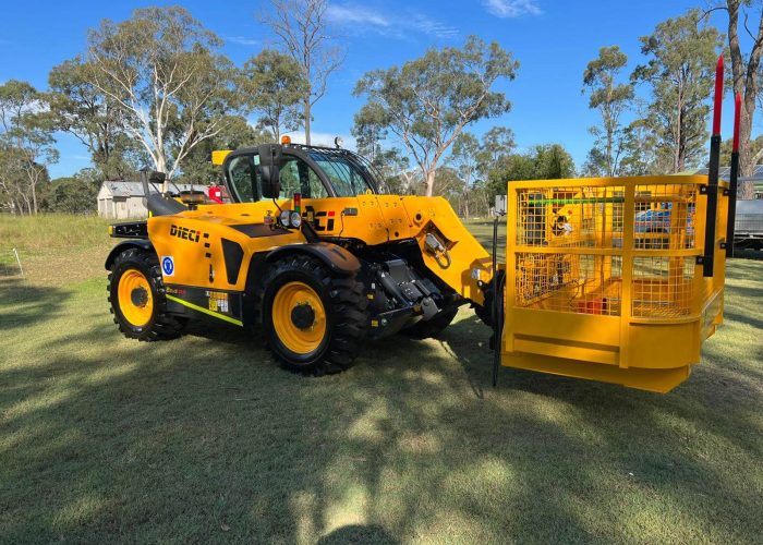 Front right side view of a Dieci Zeus 33.11 3.3T Telehandler with a yellow man backet