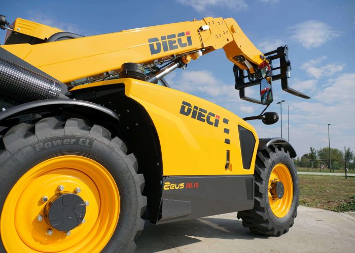 right side view of the Dieci Zeus 38.10 3.8T Mining Telehandler with its forks and boom in the air