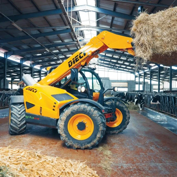 agricultural telehandler working in a farm shed feeding animals and livestock in Sydney, Australia