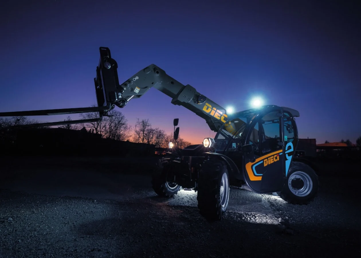 Apollo-e 2.6t electric telehandler working at night time with lights
