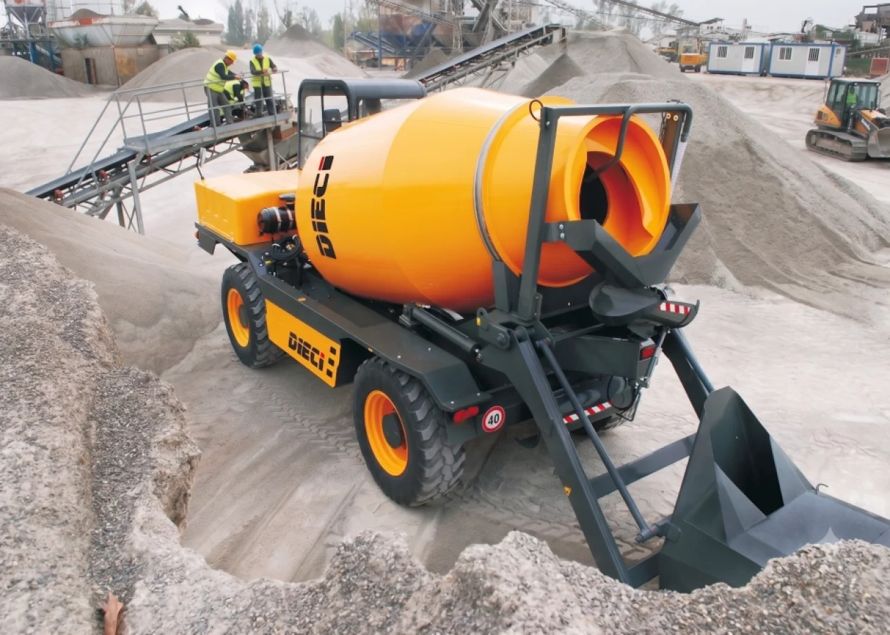 A Dieci concrete mixer truck being filled with concrete