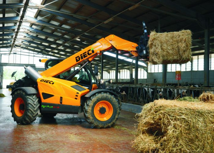 Dieci Haymaster 4t Agricultural Telehandler with 4 tonne lift capacity placing hay bales for animal feed in a livestock shed in Australia