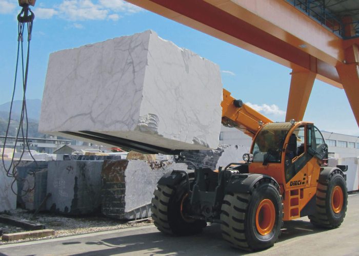 Dieci Hercules 210.10 21T Telehandler carrying a 21 tonne concrete block for maintenance and construction in Australia