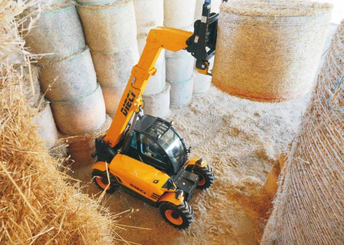 top down view of Mini Agri 2.5t Agricultural Telehandler lifting a hay bale in an Australian farm shed