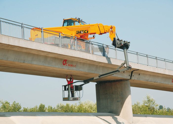 Dieci Pegasus 400° 3.8t Rotating Telehandler working on a concrete bridge with a man basket on an infrastructure project in Australia