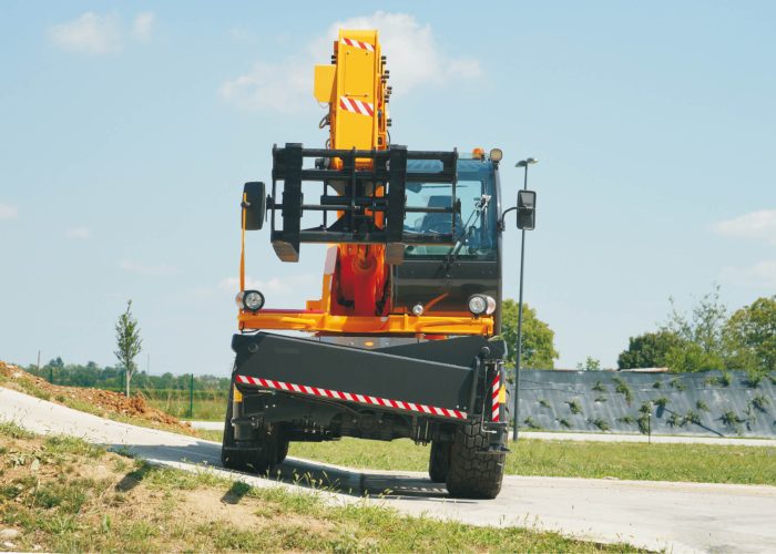 Pegasus 360 50.21 5t Rotating Telehandler with its stabiliser legs retracted moving to an Australian construction project