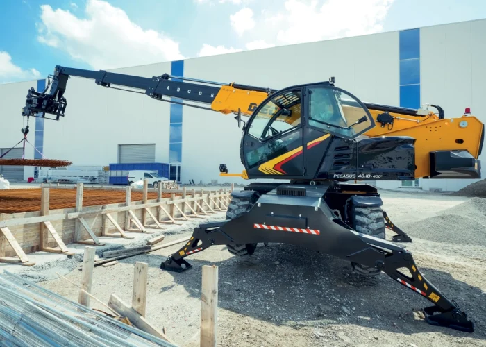 front view of a Dieci Pegasus 60.21 6t rotating telehandler with its boom raised and outriggers deployed