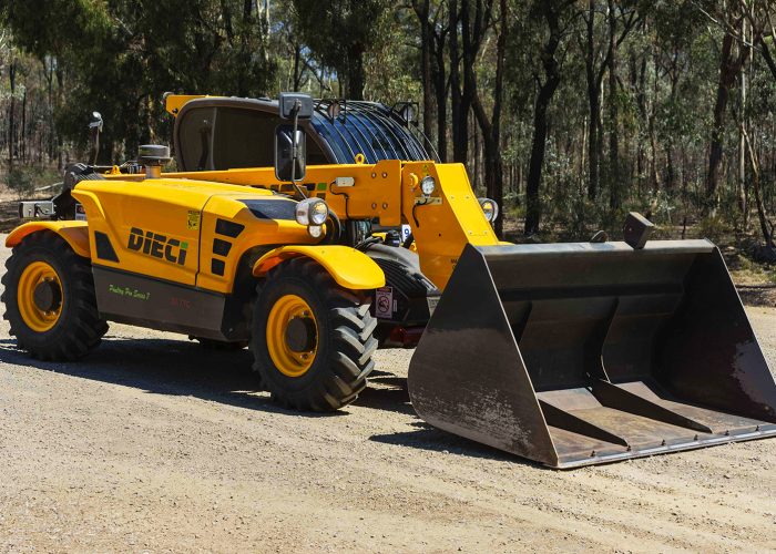right side view of a Poultry Pro 3t Telehandler with its boom and bucket lowered