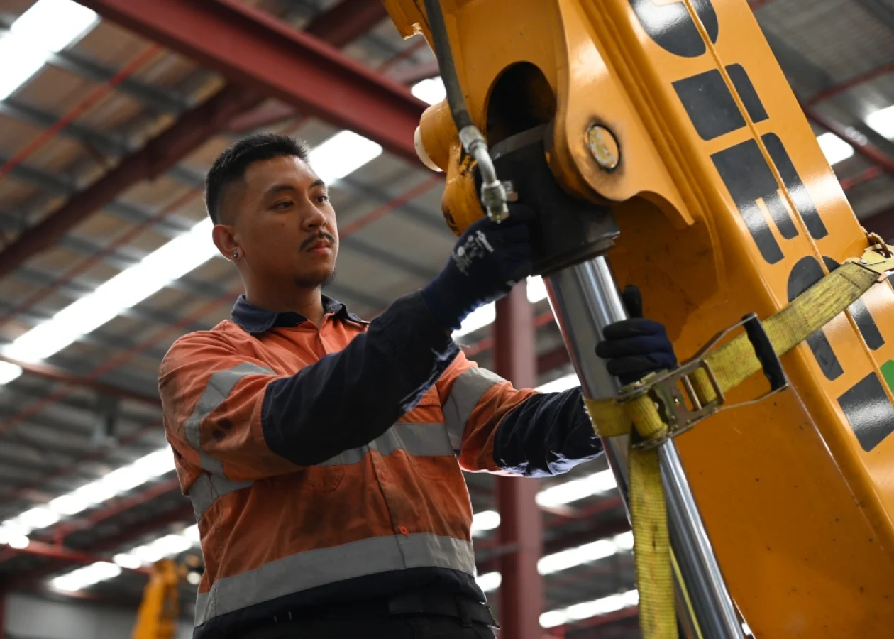 a maintenance technician providing aftersales support and scheduled maintenance on a Dieci telehandler